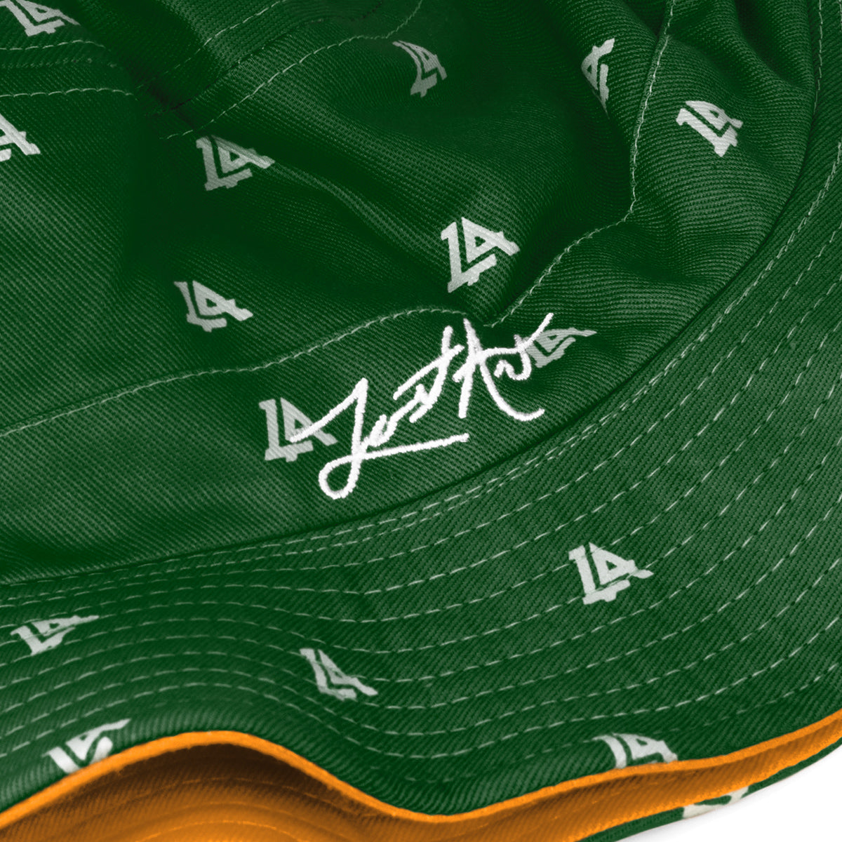 Lost Art Canada - green orange coloured bucket hat inside close up