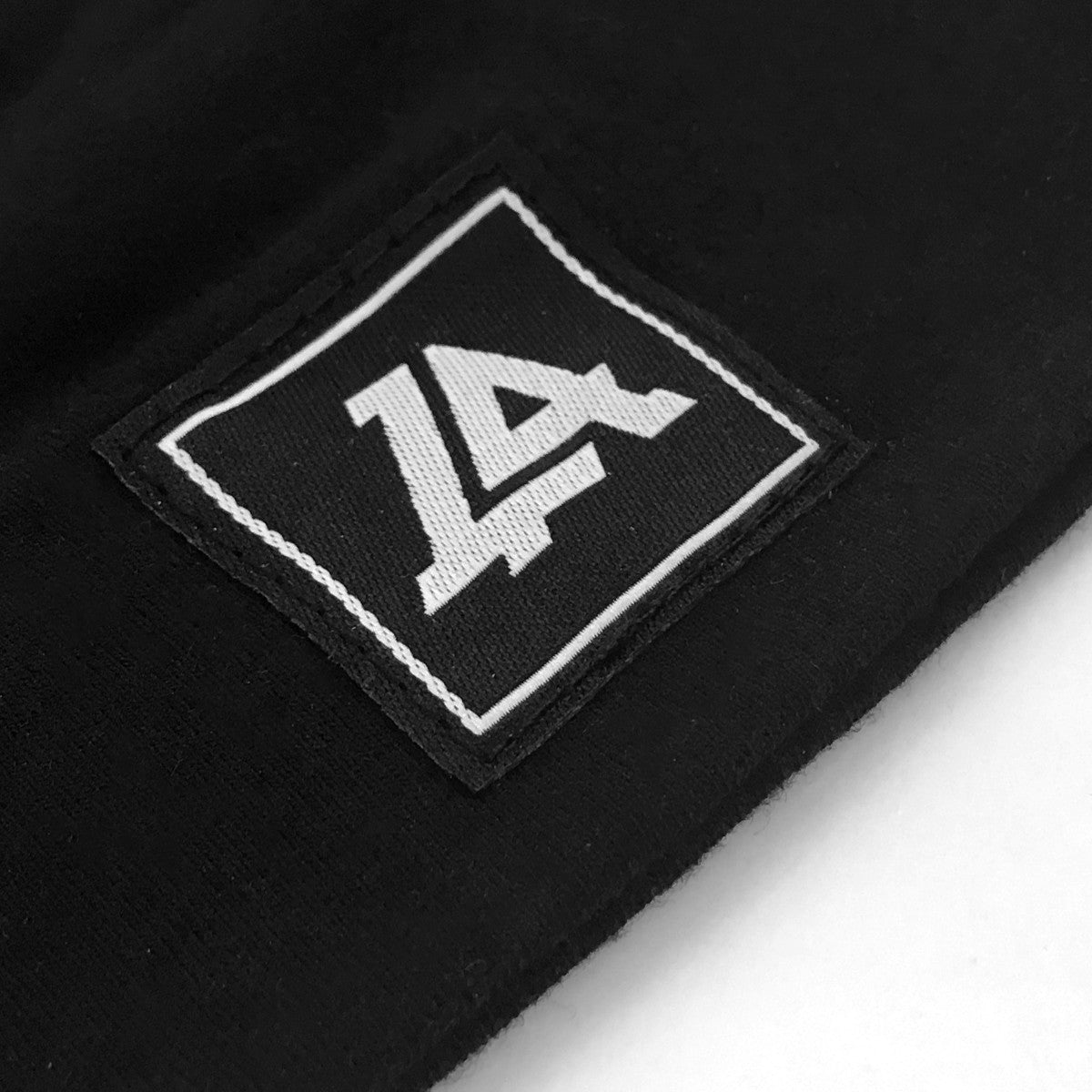 Lost Art Canada - black baby winter toque close up
