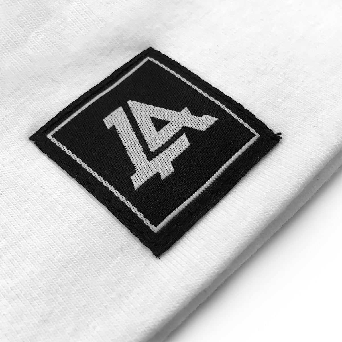 Lost Art Canada - white baby winter toque close up