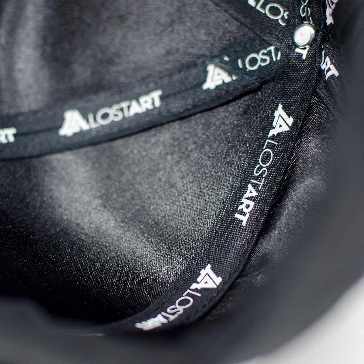 Lost Art Canada - blue logo black snapback hat inside view