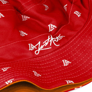 Lost Art Canada - red orange coloured bucket hat inside close up