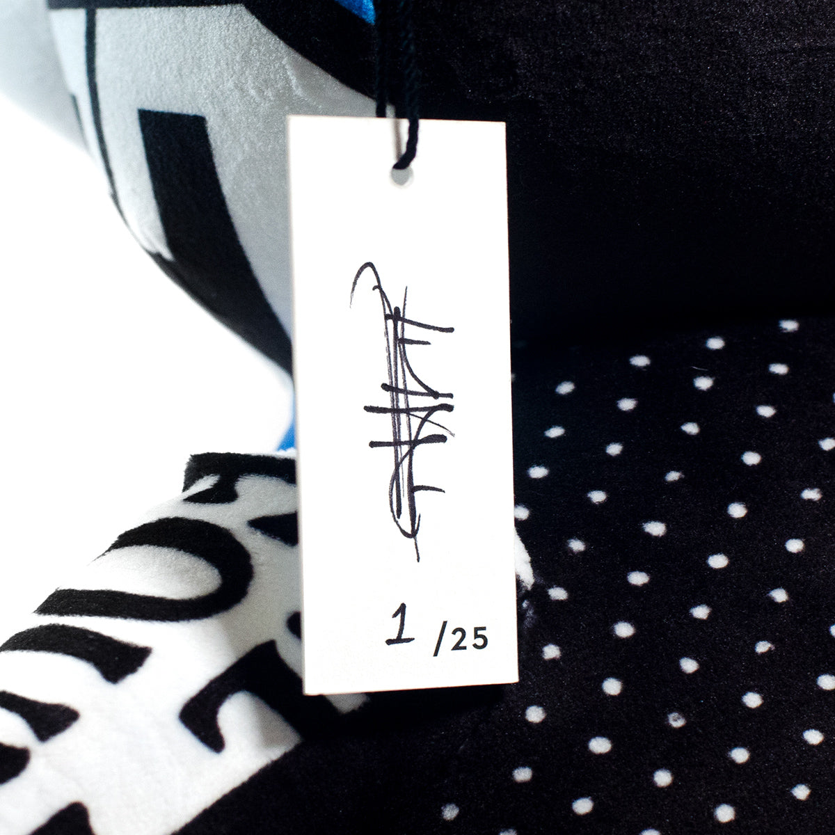Lost Art Canada - black white blue patterned teddy bear signature view