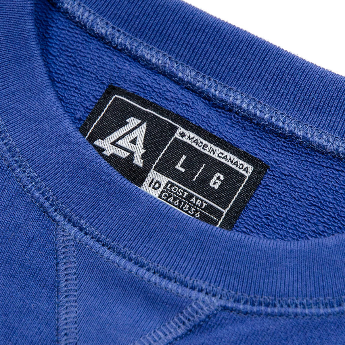 Lost Art Canada - blue lost art class crewneck sweatshirt inside tag view