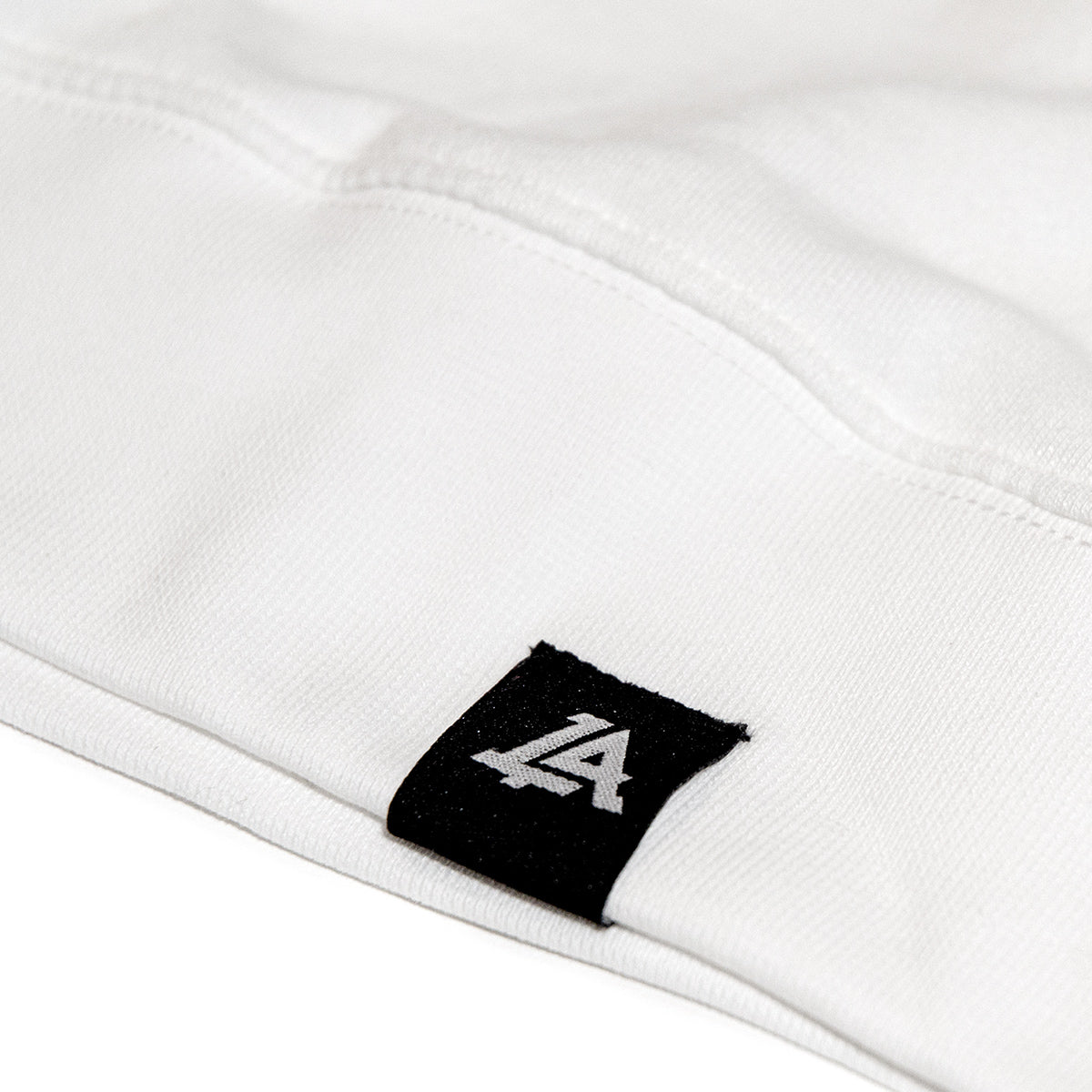 Lost Art Canada - white stay sharp crewneck sweatshirt tag view