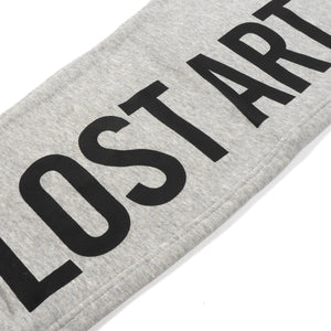 Lost Art Canada - grey leisure suit sweatsuit sweatpants leg view