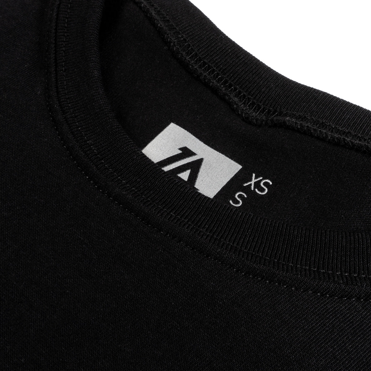 Lost Art Canada - black tagless basic tee inside tag view